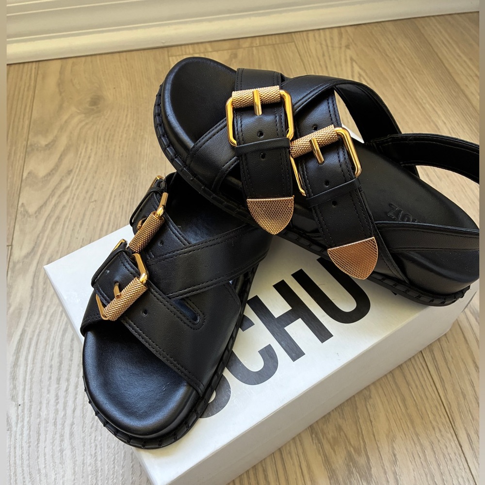 SCHUTZ Black Sandals with Gold Accents